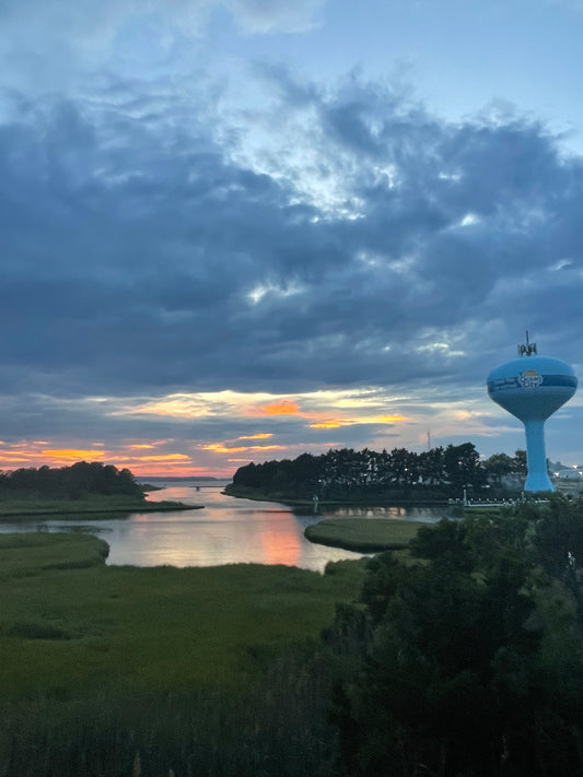 Ocean City Maryland Sunset over the bay with Ocean City Water Tower